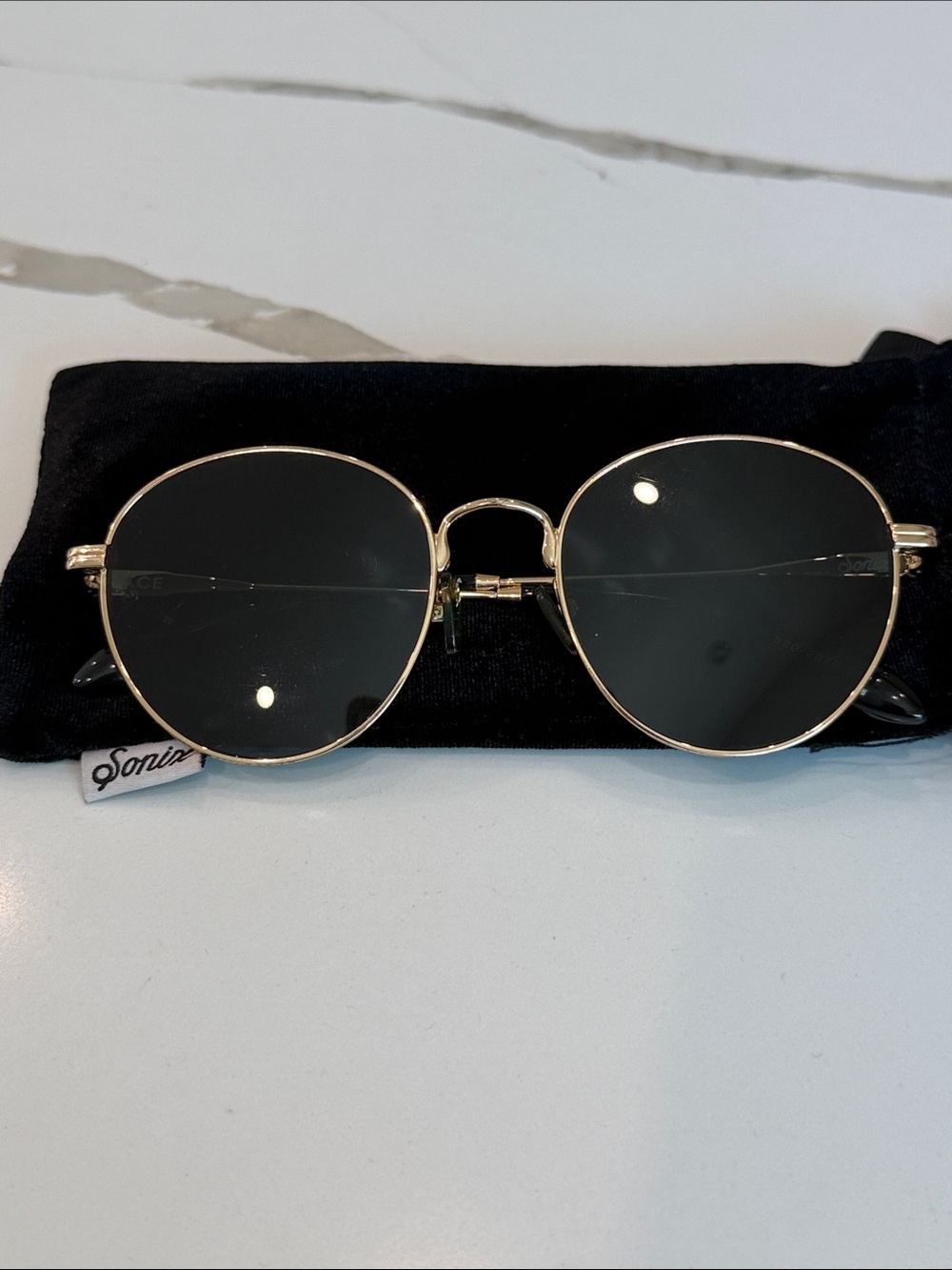 Sonix Gold Frame Sunglasses with Black Lenses
